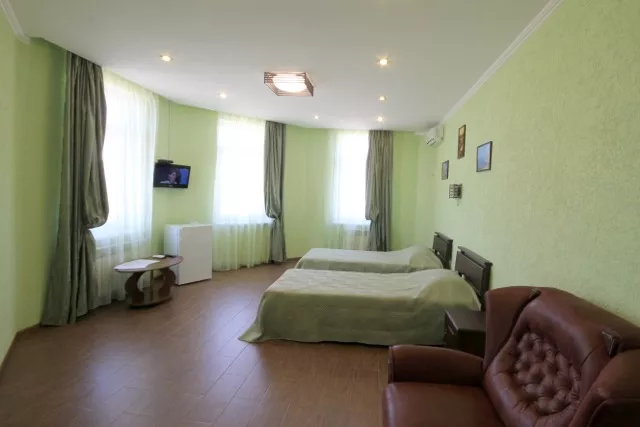 Четырехместный номер с балконом «Де люкс/De Luxe». Гостевой дом  Vega. Заозерное