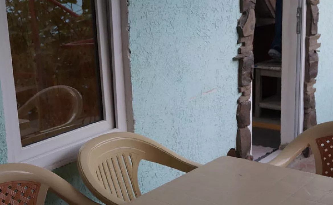 Четырехместный номер стандарт с кухней. Гостевой дом "У Леопольдовича". Малореченское