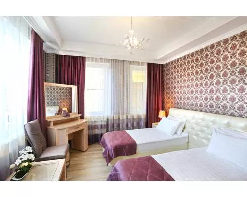 Улучшенный двухместный номер с 1 кроватью или 2 отдельными кроватями . Гостевой дом Tutu. Адлер