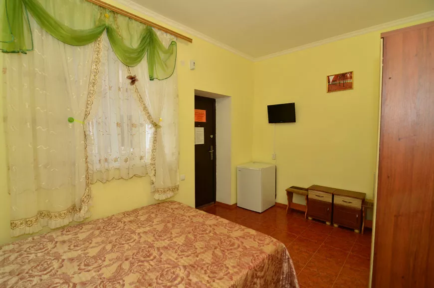 4-местный номер «Мятный». Гостевой дом Гостевой дом «Радуга». Саки 4-местный номер «Мятный». Гостевой дом Гостевой дом «Радуга». Саки