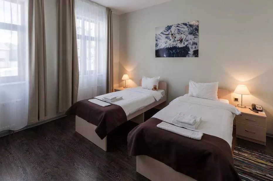 3-, 4-комнатный номер для компаний. Отель "Rosa Ski Inn"   . Красная Поляна