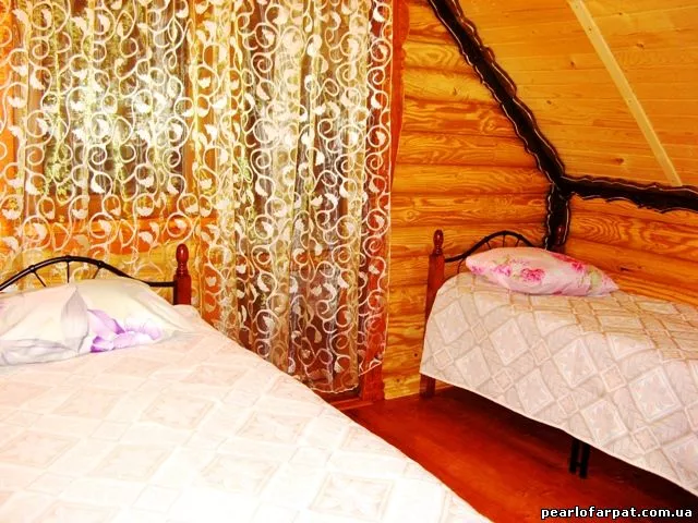 Двухэтажный деревянный коттедж категории 