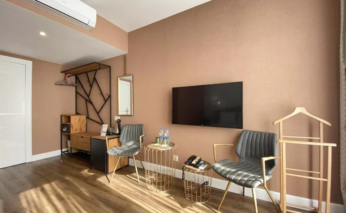 Улучшенный номер с кроватью размера 