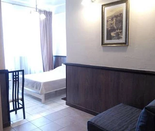 Номер № 1 «Улучшенный комфорт» 2+1. Отель "Таверна". 