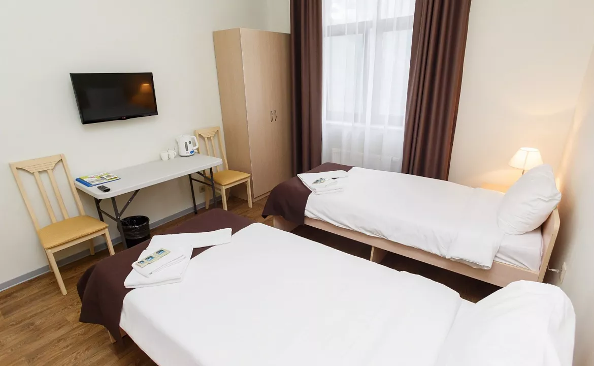 Комната в 3-комнатном номере с общей ванной, корпус В. Отель "Rosa Ski Inn"   . Красная Поляна