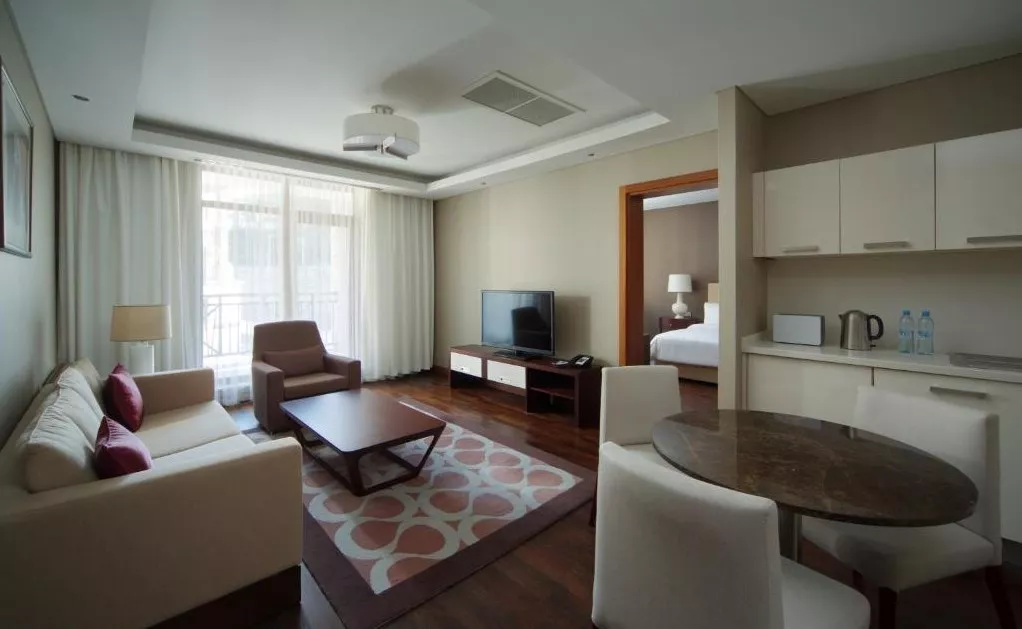 Семейный люкс с 2 спальнями. Курортный отель Sochi Marriott Krasnaya Polyana . Красная Поляна