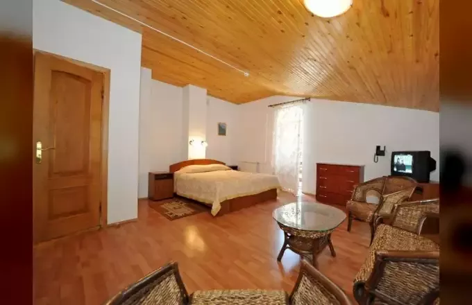 «Люкс» с камином (2-х уровневый). Отель «Поворот». Эльбрус - гостиницы