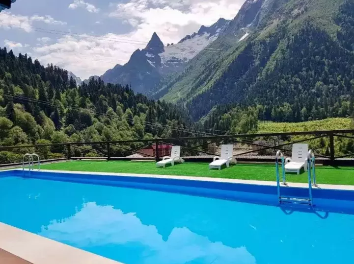 . Апартаменты «Вершина». Домбай - апартаменты