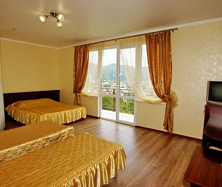 4-МЕСТНЫЙ НОМЕР СТАНДАРТ С БАЛКОНОМ. Гостевой дом "Лето".  4-МЕСТНЫЙ НОМЕР СТАНДАРТ С БАЛКОНОМ. Гостевой дом "Лето".