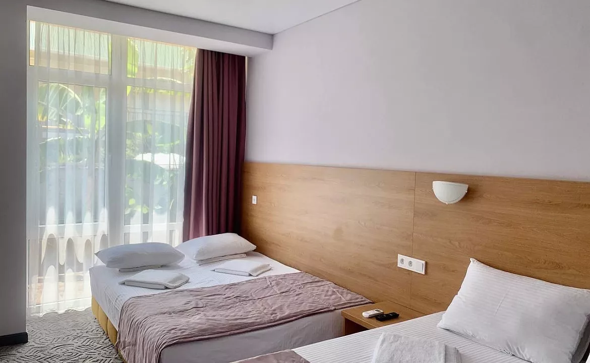 Cемейный номер с собственной ванной комнатой. Отель "Family Club". Лазаревское Cемейный номер с собственной ванной комнатой. Отель "Family Club". Лазаревское