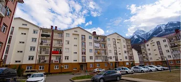 Квартира в многоквартирном доме Квартира в Горах 