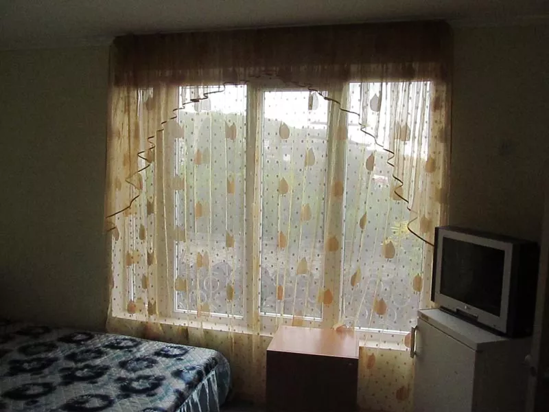 Четырехместный номер стандарт с кухней. Гостевой дом "У Леопольдовича". Малореченское