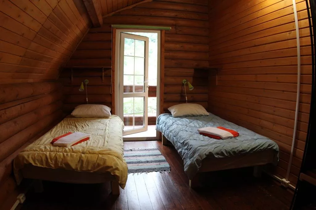 Домик. Гостевой дом "ДОМ АБОРИГЕНА" Комфортные апартаменты и коттеджи . Красная Поляна