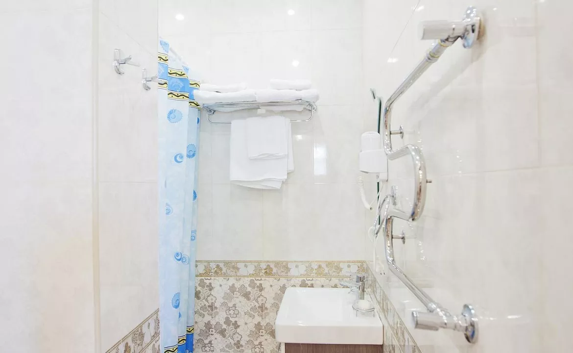 Четырехместный номер с балконом «Де люкс/De Luxe». Гостевой дом  Vega. Заозерное