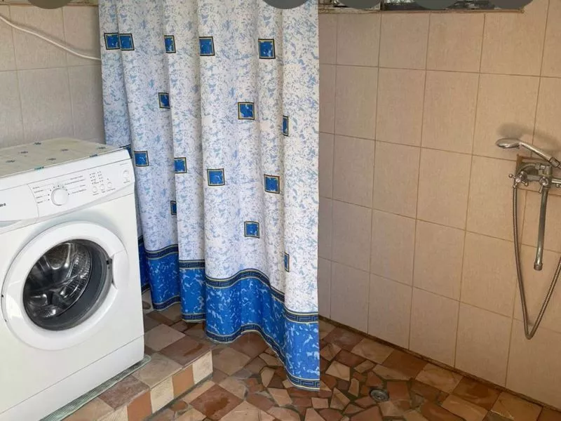 . Гостевой дом "У подножья пещеры". Новый Афон