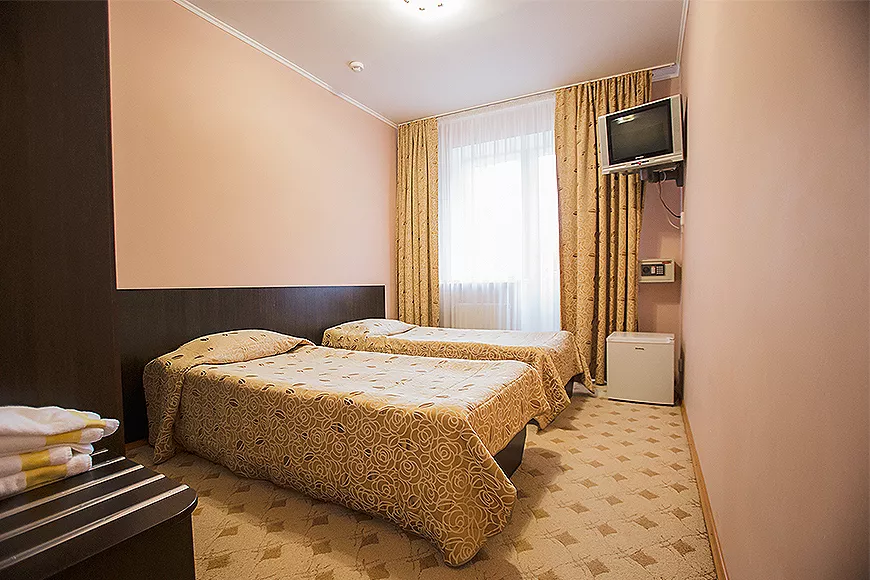 Стандарт TWIN Двухместный однокомнатный. Отель Сеть отелей «Снежный Барс». Домбай