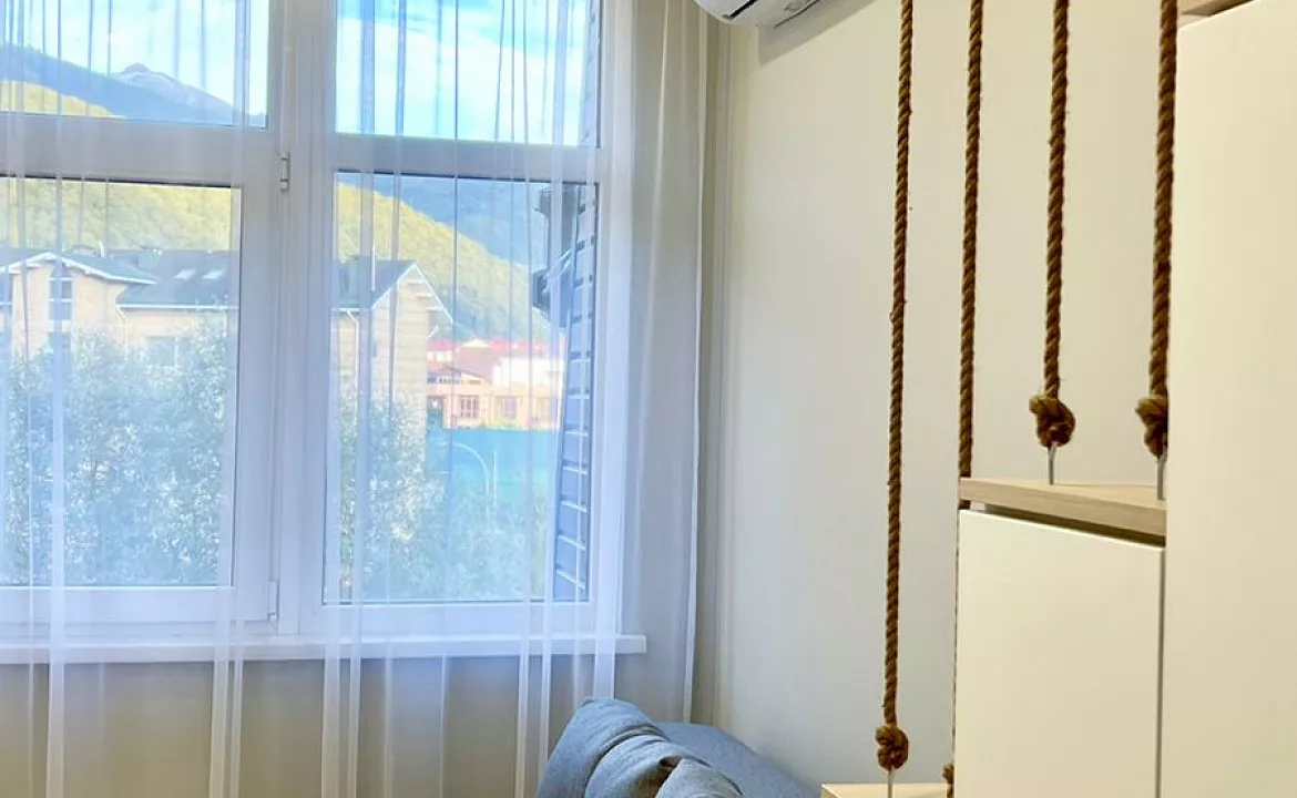 Апартаменты Red Glade. Квартира в многоквартирном доме Двухуровневая студия. Красная Поляна