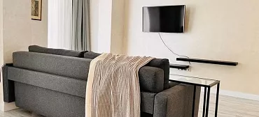 Квартира в многоквартирном доме Апартаменты на Просторной