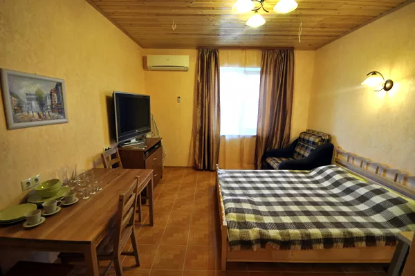 Апартаменты с гостиной, двумя спальнями и верандой. Гостиница "Resort-betta"   . Бетта