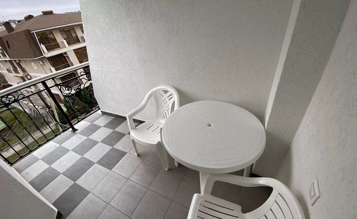 Улучшенный трехместный номер с 1 кроватью или 2 отдельными кроватями и креслом-кроватью. Отель BLUE MARINE HOTEL. Адлер