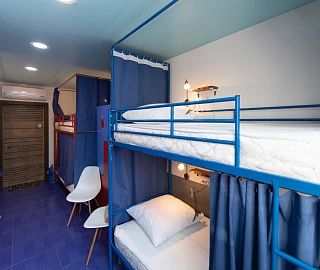 Кровать в общем 8-местном номере для женщин. Хостел Bamboo Hotel. Кровать в общем 8-местном номере для женщин. Хостел Bamboo Hotel.