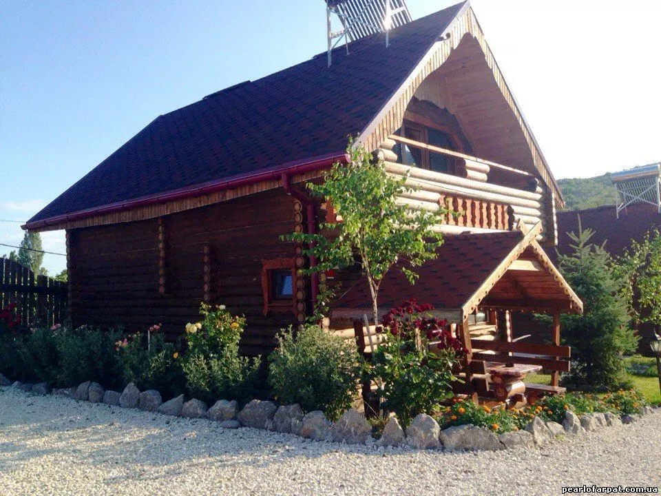 Двухэтажный деревянный коттедж категории 