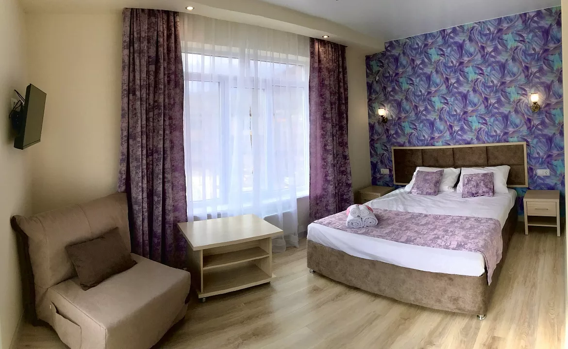 Трехместный номер Делюкс. Гостевой дом Дом ДиОкс. Агой