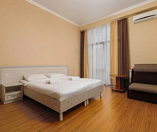 Номер комфорт с балконом для 3 гостей. Гостевой дом Ева. 