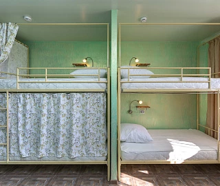 Кровать в общем номере для женщин с 4 кроватями. Хостел Bamboo Hotel. Кровать в общем номере для женщин с 4 кроватями. Хостел Bamboo Hotel.