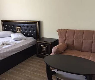 Комфортный номер с кроватью king-size. Гостевой дом "ЛиДиАнна". Комфортный номер с кроватью king-size. Гостевой дом "ЛиДиАнна".