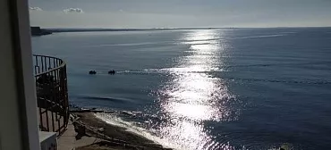 Квартира в многоквартирном доме "Апартаменты у моря"