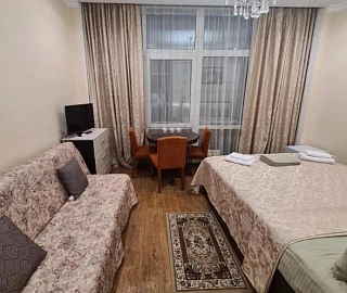 Трехместный номер с собственной ванной комнатой. Отель На Поляне. 