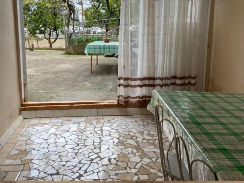 . Гостевой дом "У подножья пещеры". Новый Афон