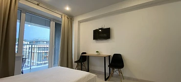 Квартира в многоквартирном доме Квартира на первой береговой линии с красивым видом на морской закат