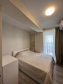 Квартира в многоквартирном доме 2-комнатная квартира с панорамными окнами у моря