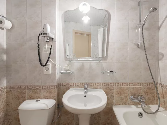 Однокомнатный двухместный улучшенной планировки с двумя раздельными кроватями. Отель "Магнолия". Сочи