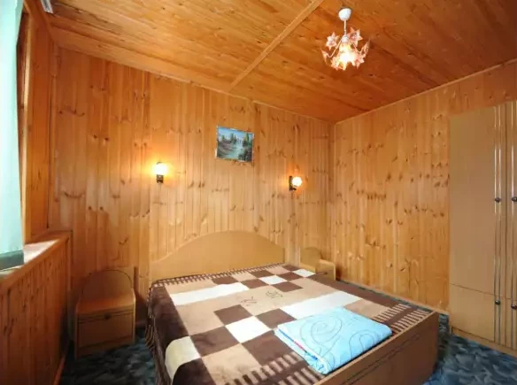 Апартаменты. 2-х этажный корпус. Гостиничный комплекс «Таулу». Домбай-гостиницы