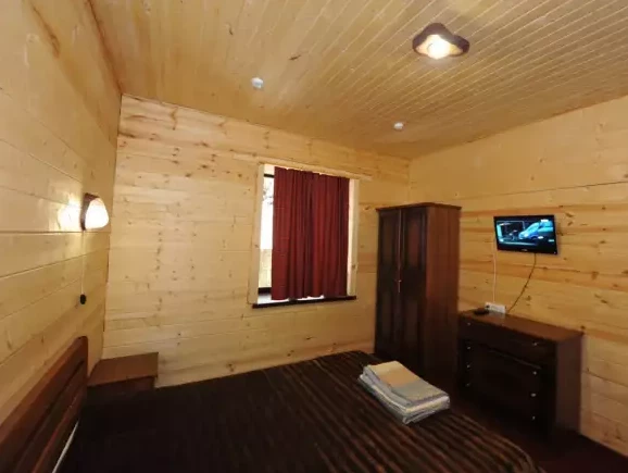 Апартаменты. Новый корпус. Гостиничный комплекс «Таулу». Домбай-гостиницы