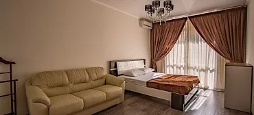 Квартира в многоквартирном доме Двухкомнатная квартира у пляжа