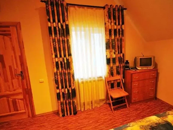 Коттедж. Отель «Каприз». Домбай-гостиницы